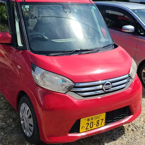 与論旅のお供: 赤い軽自動車にて早速散策開始！